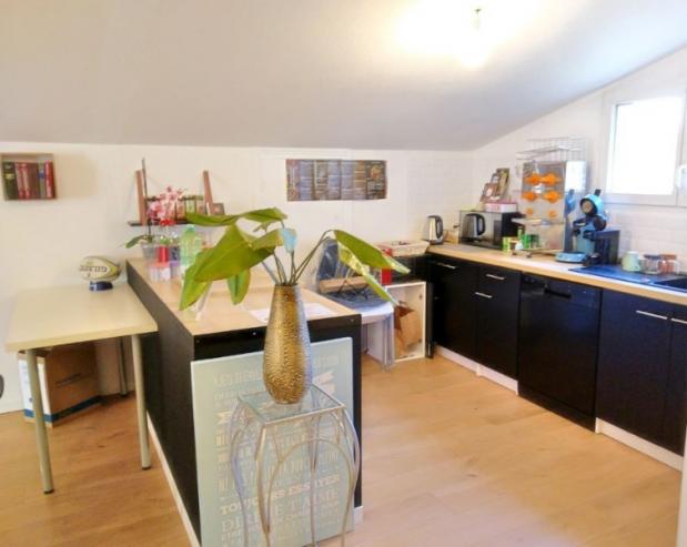 Espace de travail et cuisine 